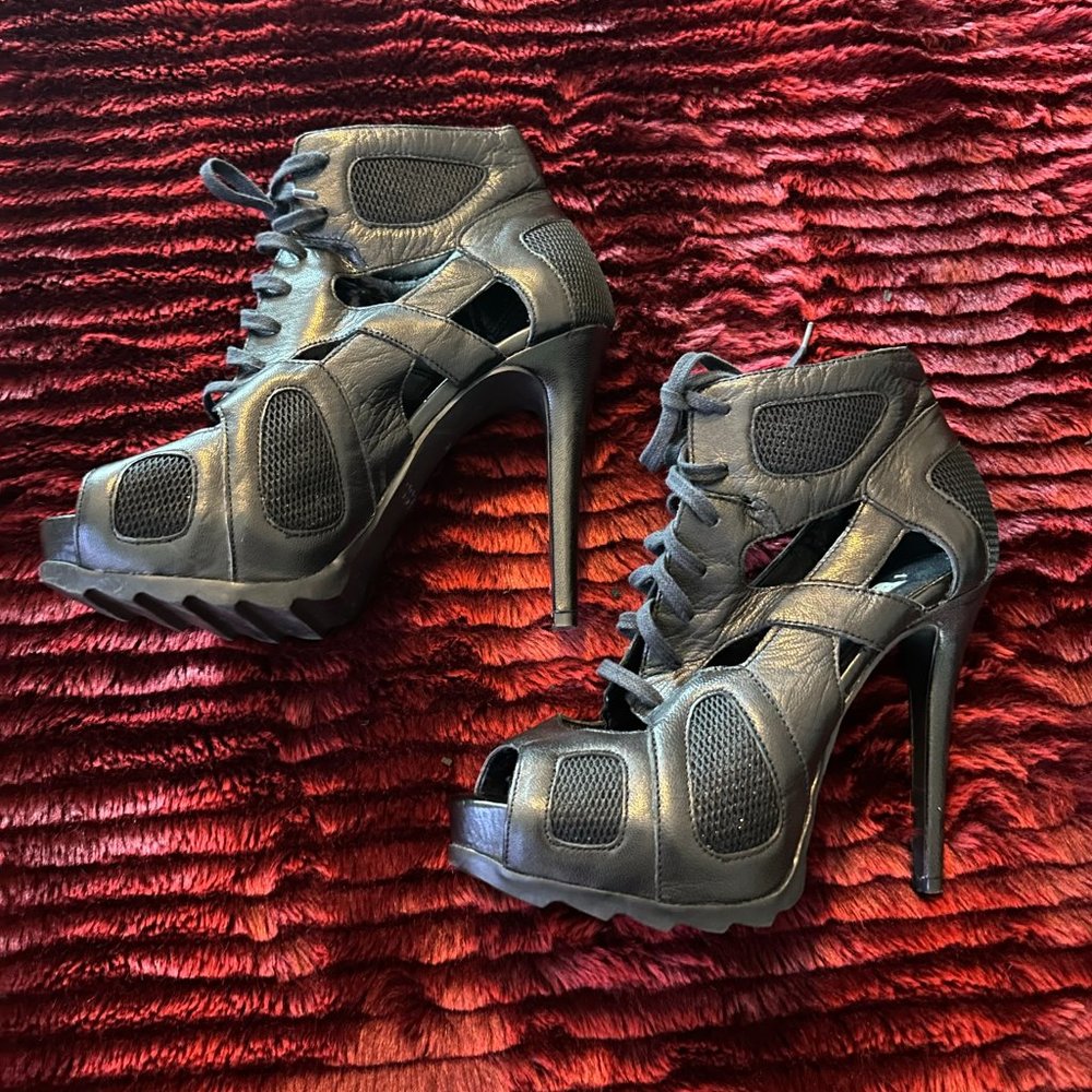 GUESS leather feminine combat black heel booties. Size 5.5